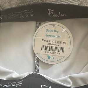 Fishy leggings size M. Never warn was gifted but too big.